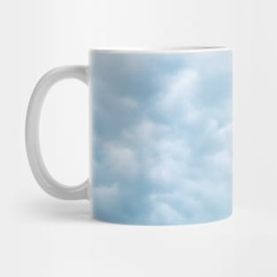 Beautiful light blue puffy clouds Mug